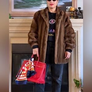 vintage Givenchy Fourrure mink coat in a light brown color  size 10